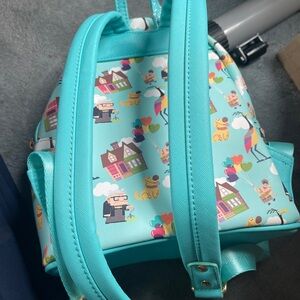 Its a beautiful blue UP themed bad. Its a tiny backpack